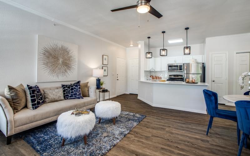 a living room with a couch and a table